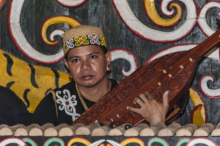 Dayak musician at Pampang Cultural Tourism Village